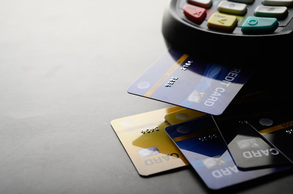 What are the features of a secured credit card?